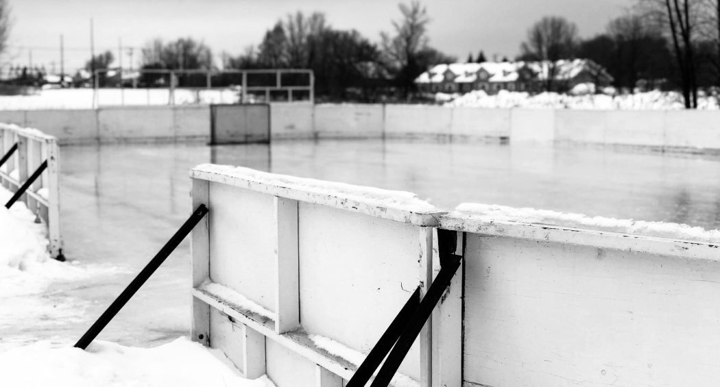 Empty outdoor ice hockey rink