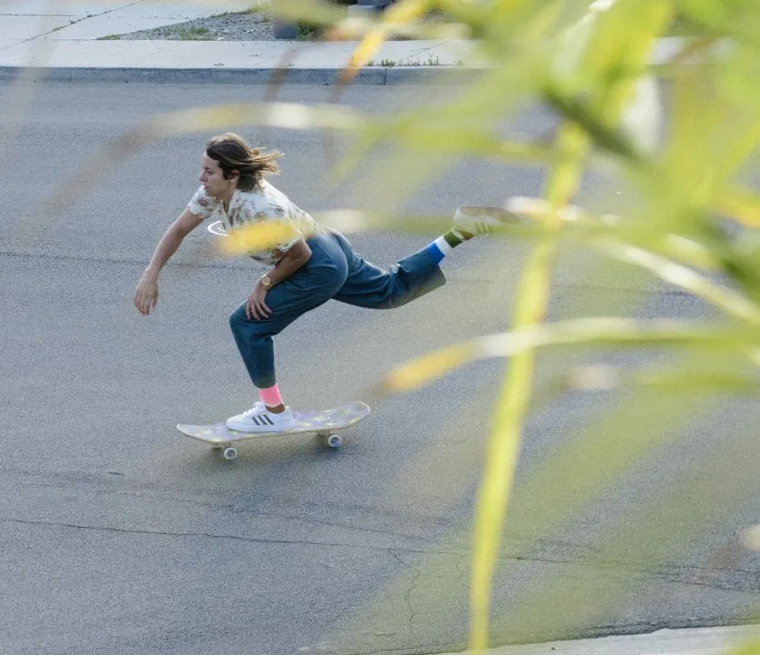 Skater pushing their skateboard