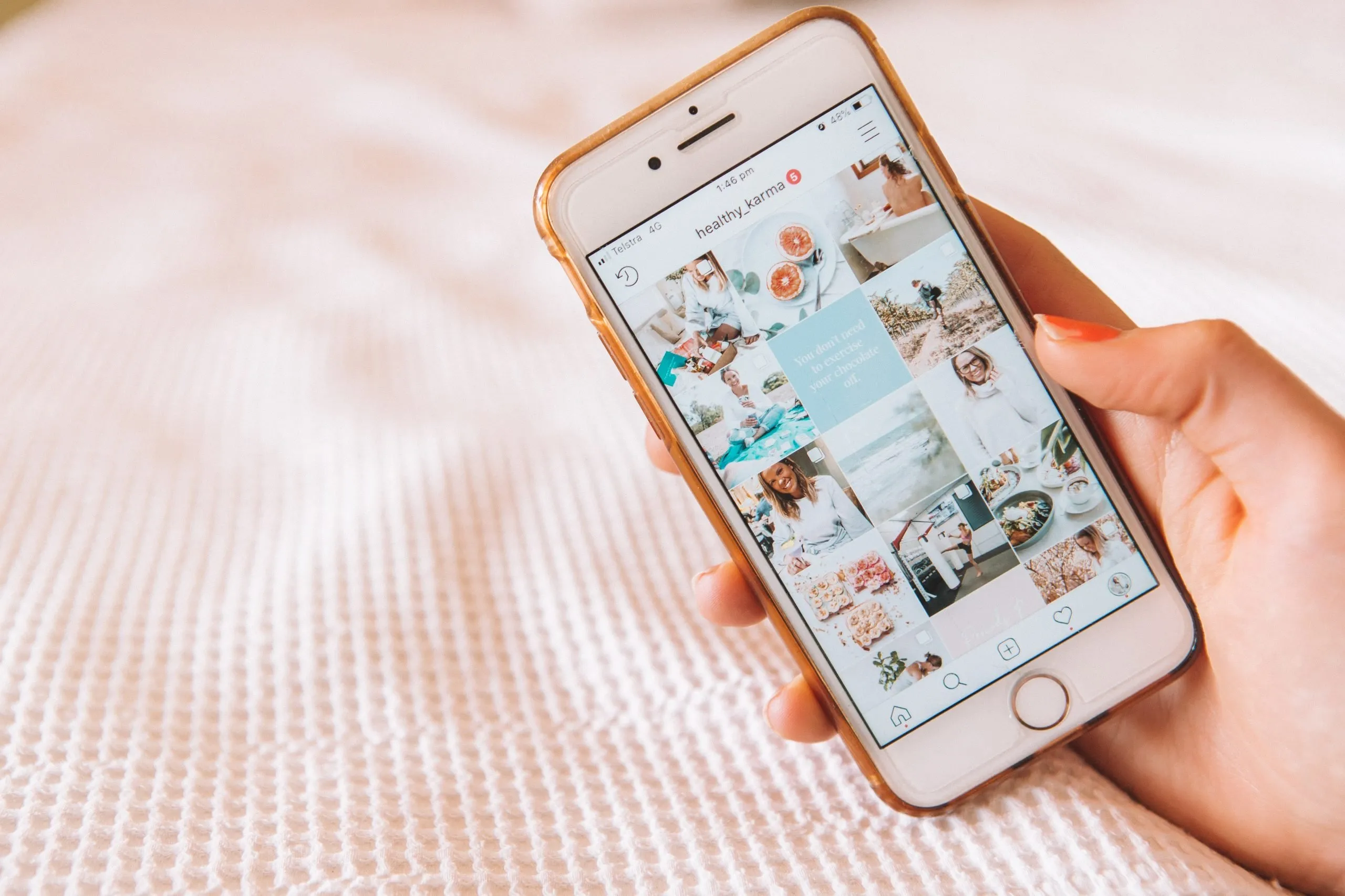 Someone's Instagram posts displayed on an iPhone