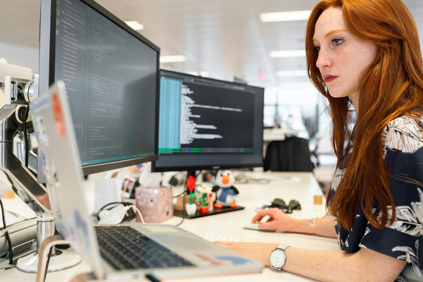 Girl looking at data on computer