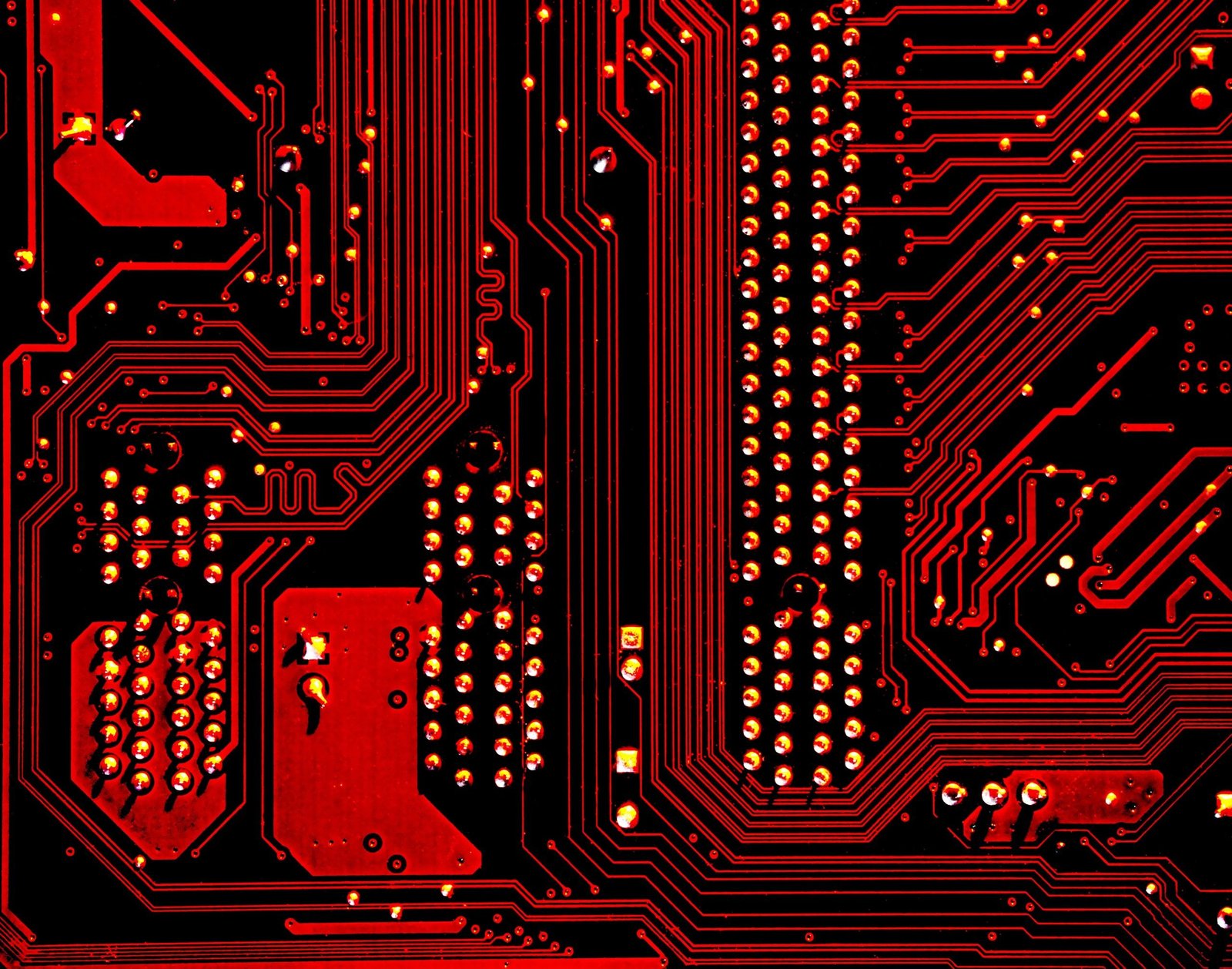 zoomed up view of a computer chip with red lighting