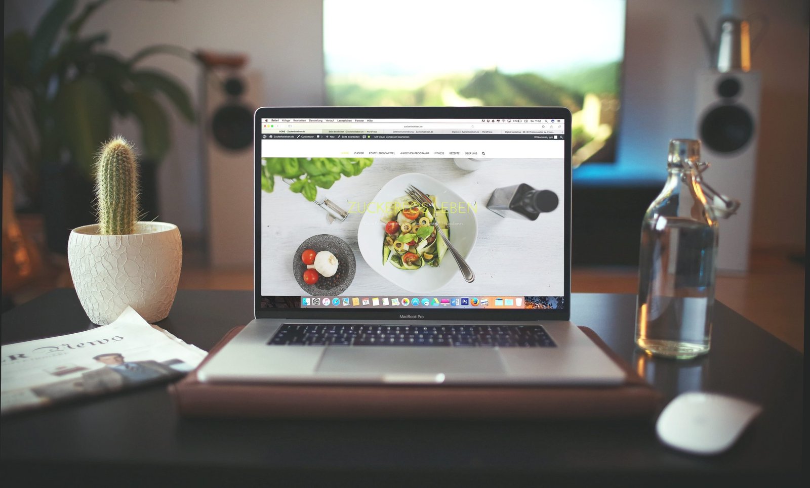 Laptop showing the landing page of a foodie website
