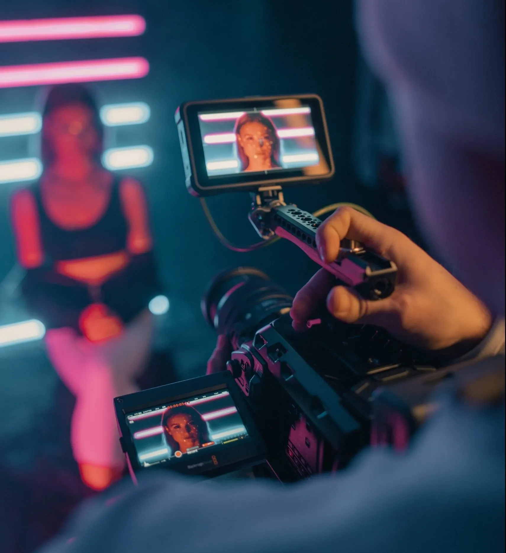 woman posing in front of a camera