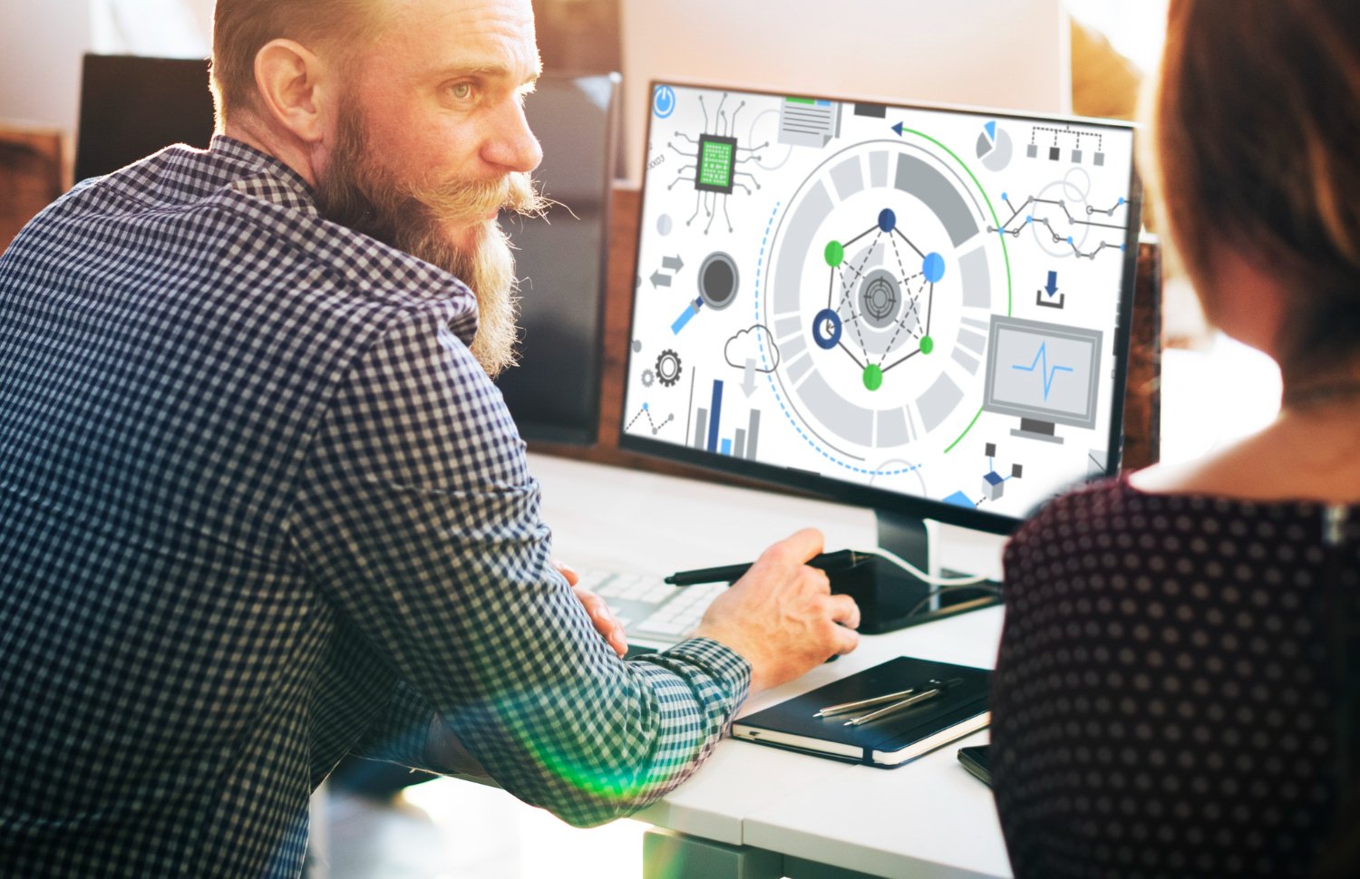 Man Looking at design on computer